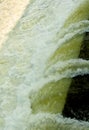 River water from the dam shutter texture background with bubbles. Royalty Free Stock Photo