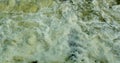 River water from the dam shutter texture background with bubbles. Royalty Free Stock Photo