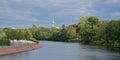 River Spree with trees on the shore and TV tower in the background in Berlin