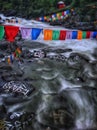 A river with stone inscriptions of Tibetan scriptures Royalty Free Stock Photo
