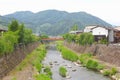 Panorama mountains river bridge village Hida Furukawa, Japan