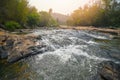 River stream waterfall in forest landscape, beautiful nature water stream with rocks in the tropical forest little mountain Royalty Free Stock Photo