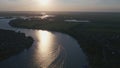 River at sunset, white boat, beautiful landscape from above