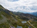 River surrounded by Gotthardpass in Schweiz with blue sky in the background Royalty Free Stock Photo