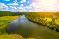 River with suspension bridge at old Urals village, Russia. Royalty Free Stock Photo