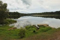 River landscape before dam with boat berth