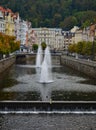 River Tepla and typical colourful terrace buildings in Karlovy Vary Czech Republic