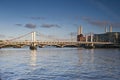 River Thames Grosvenor Rail Bridge and Battersea Power Station blue sky clouds Royalty Free Stock Photo