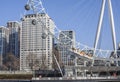 The River Thames and The London Eye, blue sky. Royalty Free Stock Photo