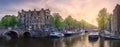 River, traditional old houses and boats, Amsterdam Royalty Free Stock Photo