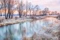 River and trees in autumn in winter morning Royalty Free Stock Photo