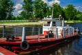 The river tug of red color that that transports on the river Royalty Free Stock Photo