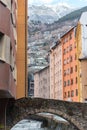 River Valira on Engordany Bridge and houses view in a snowfall day in small town Escaldes-Engordany in Andorra on January 16, 201