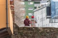 River Valira on Engordany Bridge and houses view in a snowfall day in small town Escaldes-Engordany in Andorra on January 16, 201