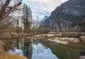 River in Foreground with Reflection of Forest and Mountains Royalty Free Stock Photo