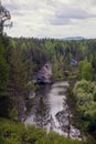 The blue ribbon of the river from the height of the mountains. Wild nature, taiga. Tourism. Far East, Sakhalin Island, Russia. Royalty Free Stock Photo