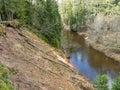 River view in early spring, beautiful cloud reflections in water Royalty Free Stock Photo