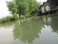 River water on the edge of fish and shrimp farmer settlements Royalty Free Stock Photo