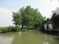 River water on the edge of fish and shrimp farmer settlements Royalty Free Stock Photo