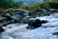 River water flowing through rocks at dawn Royalty Free Stock Photo