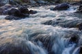 River water flowing through rocks at dawn Royalty Free Stock Photo