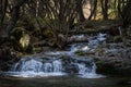 River water flows among the rocks and forms small waterfalls, RascafrÃÂ­a, Madrid, Spain Royalty Free Stock Photo