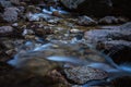 River water flows among the rocks and forms small waterfalls, RascafrÃÂ­a, Madrid, Spain Royalty Free Stock Photo
