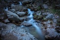 River water flows among the rocks and forms small waterfalls, RascafrÃÂ­a, Madrid, Spain Royalty Free Stock Photo