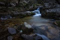 River water flows among the rocks and forms small waterfalls, RascafrÃÂ­a, Madrid, Spain Royalty Free Stock Photo