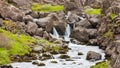 River with waterfalls in Pingvellir Iceland