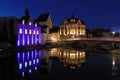 river Werra and illuminated buildings in Eschwege by night