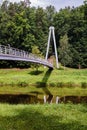 the river with a white pedestrian bridge Royalty Free Stock Photo