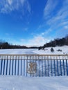 river in winter with a bridge