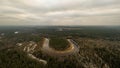 River in winter forest with green trees from above. Aerial drone image of river Gauja in Latvia Royalty Free Stock Photo