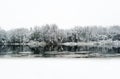 River in winter and tree branches covered with white frost. Royalty Free Stock Photo