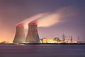 Riverbank with nuclear power plant Doel at night, Port of Antwerp