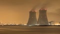 Riverbank with nuclear power plant Doel at night