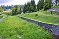 the riverbed overgrown with greenery in the mountain.