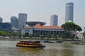 Riverboat in front of New Supreme Court, Singapore Parliament Building Royalty Free Stock Photo