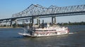 Riverboat the Natchez cruising down on the Mississippi River in New Orleans