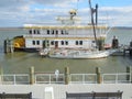 Riverboat and sailing boat in harbour