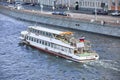 Riverboat sailing on the city river. Walks on river boats. Concept rest in the city, city walks, tourism.