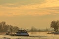 Riverboat during winter on the river IJssel in The Netherlands Royalty Free Stock Photo