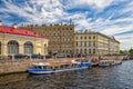 Riverbuses accosting to the pier at The Moyka river. Royalty Free Stock Photo