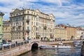 Riverbuses entering under The Second Zimny Winter bridge on the Moyka river. Royalty Free Stock Photo