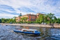 Riverbuses passing along the Fontanka river by The Mikhaylovsky Castle. Royalty Free Stock Photo