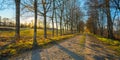 Fantastic sunset view of a riverside pathway in Galicia, Spain.