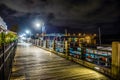 Riverfront board walk scenes in wilmington nc at night
