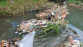 Rivers are filled with rubbish, people& x27;s habit of throwing rubbish in rivers is one of the causes of flooding