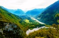 Rivers in the valley and hills in the background. Soca River in Slovenia. Royalty Free Stock Photo